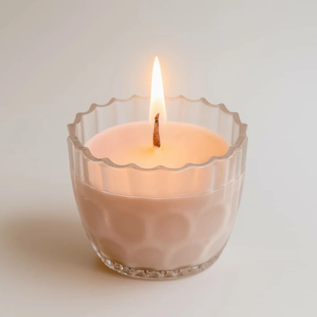 Bougie décorative rose en verre texturé